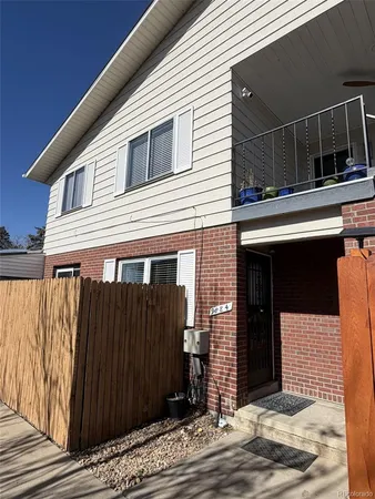 a front view of a house with parking