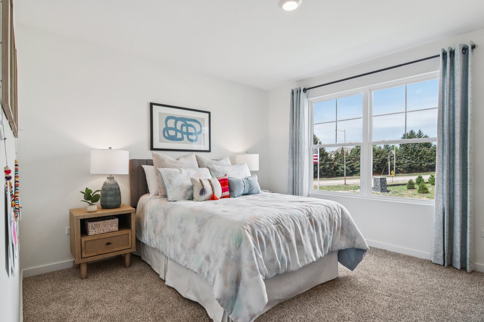 9947 Edgebrook Lane Huntley, IL 60142 - Photo 21 of 64 a bedroom with a bed and a large window