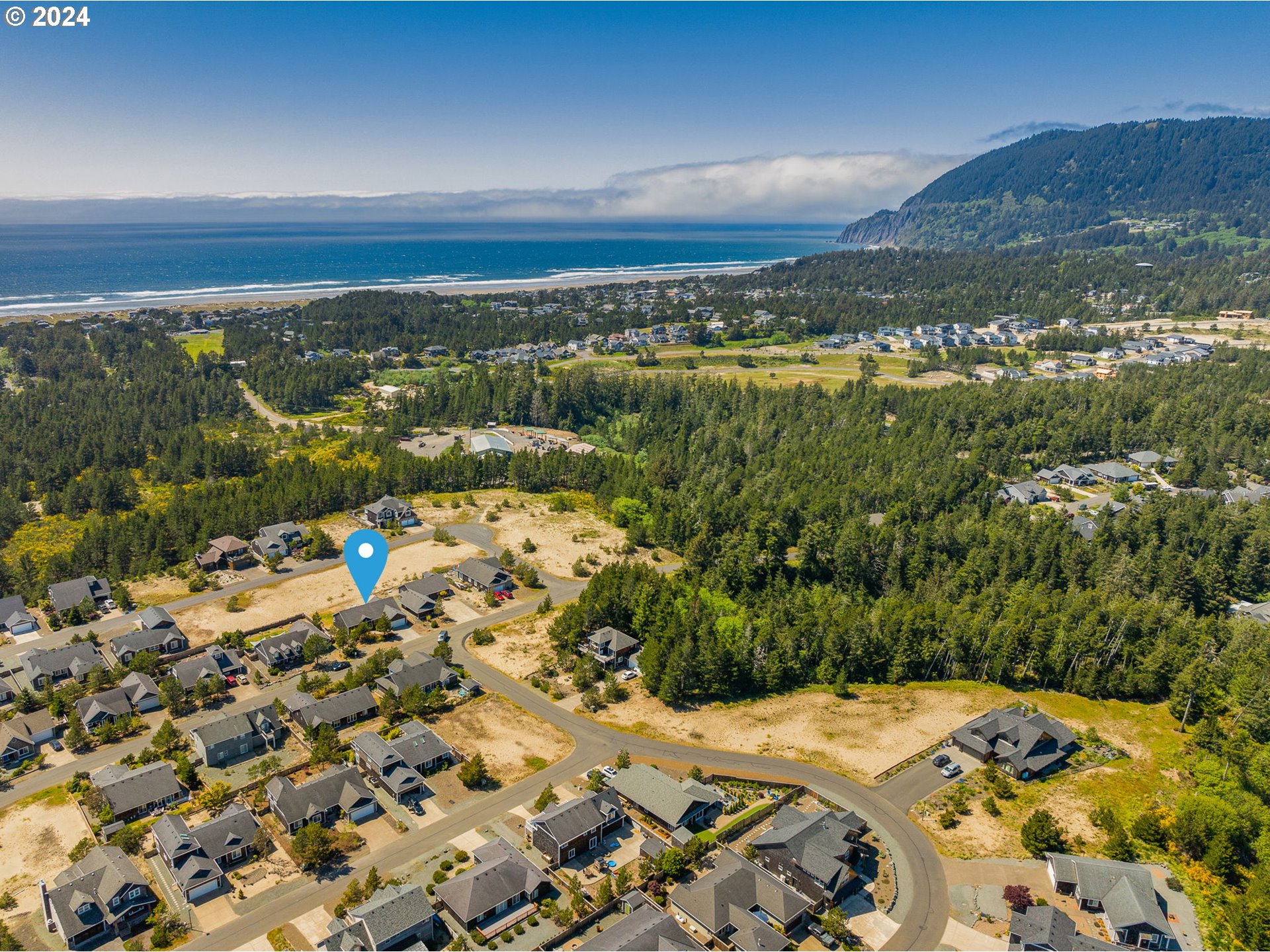 9980 Pine Ridge Drive Nehalem, OR 97131 - Photo 27 of 27 view of city and mountain