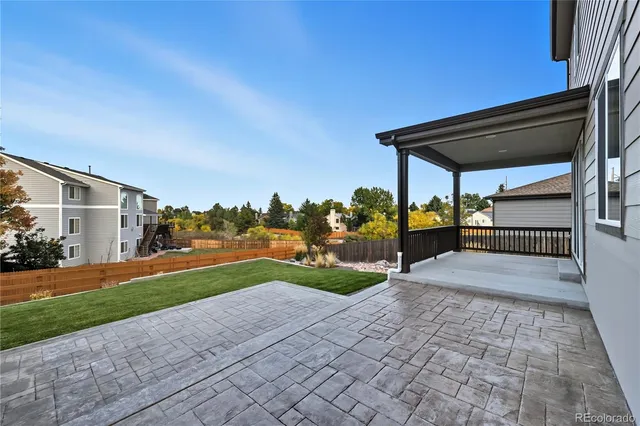 a view of a porch and garden