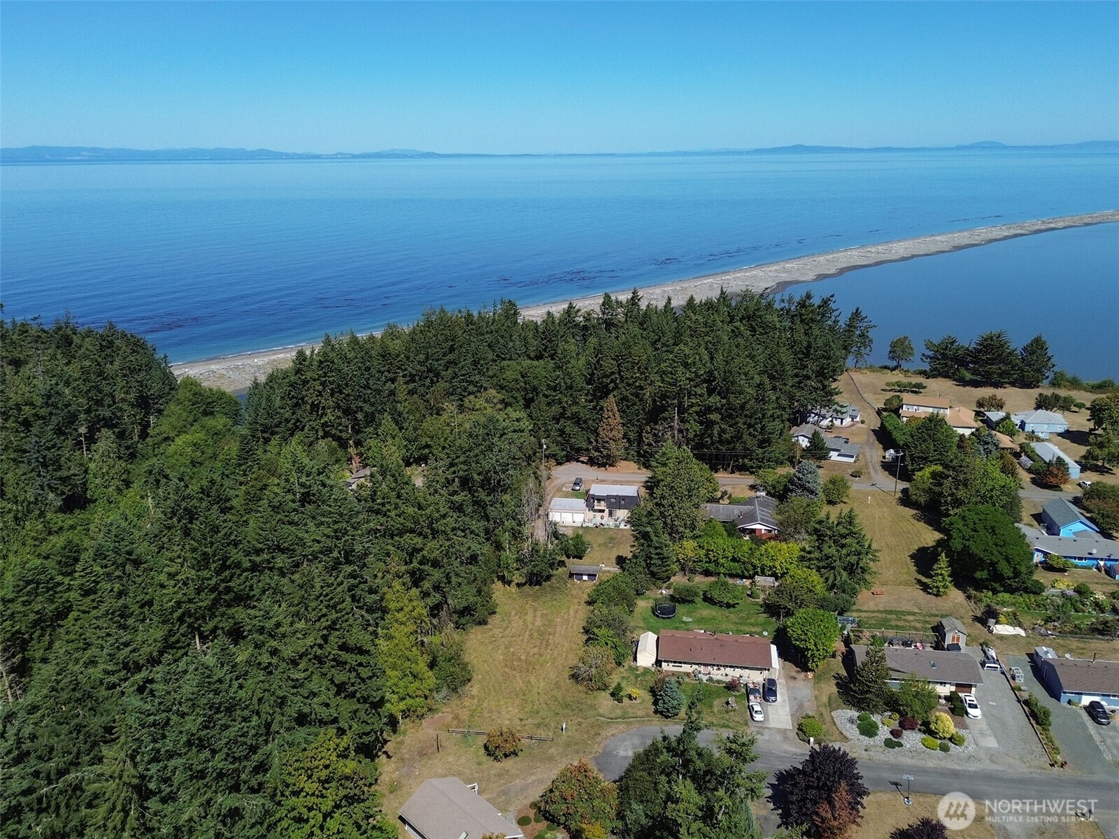 999 Bay View Street Sequim, WA 98382 - Photo 21 of 26 an aerial view of a houses with a lake view