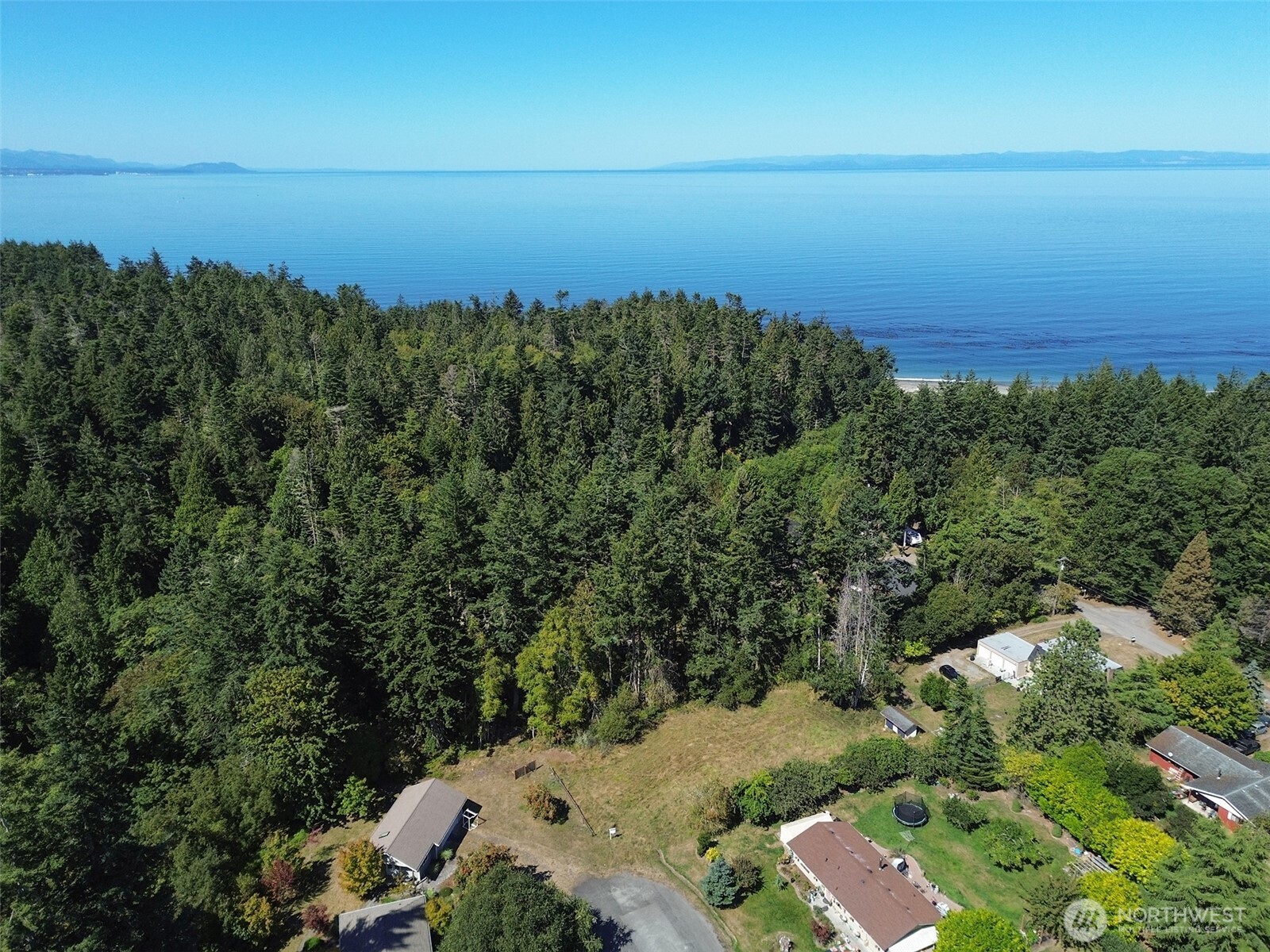 999 Bay View Street Sequim, WA 98382 - Photo 23 of 26 an aerial view of a houses with a yard