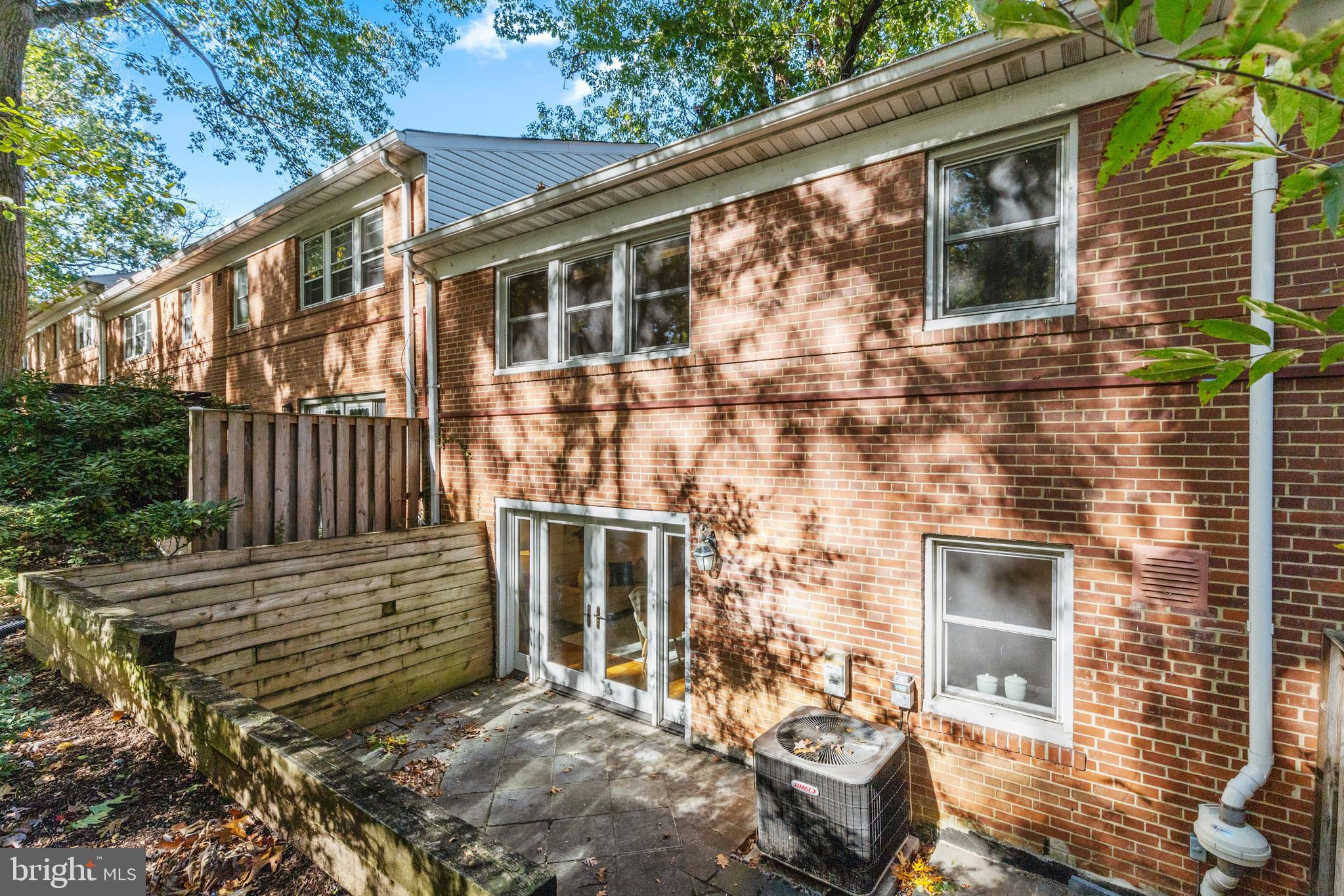 8547 Bradford Road, Unit 92 Silver Spring, MD 20901 - Photo 18 of 24 a front view of a house with stairs