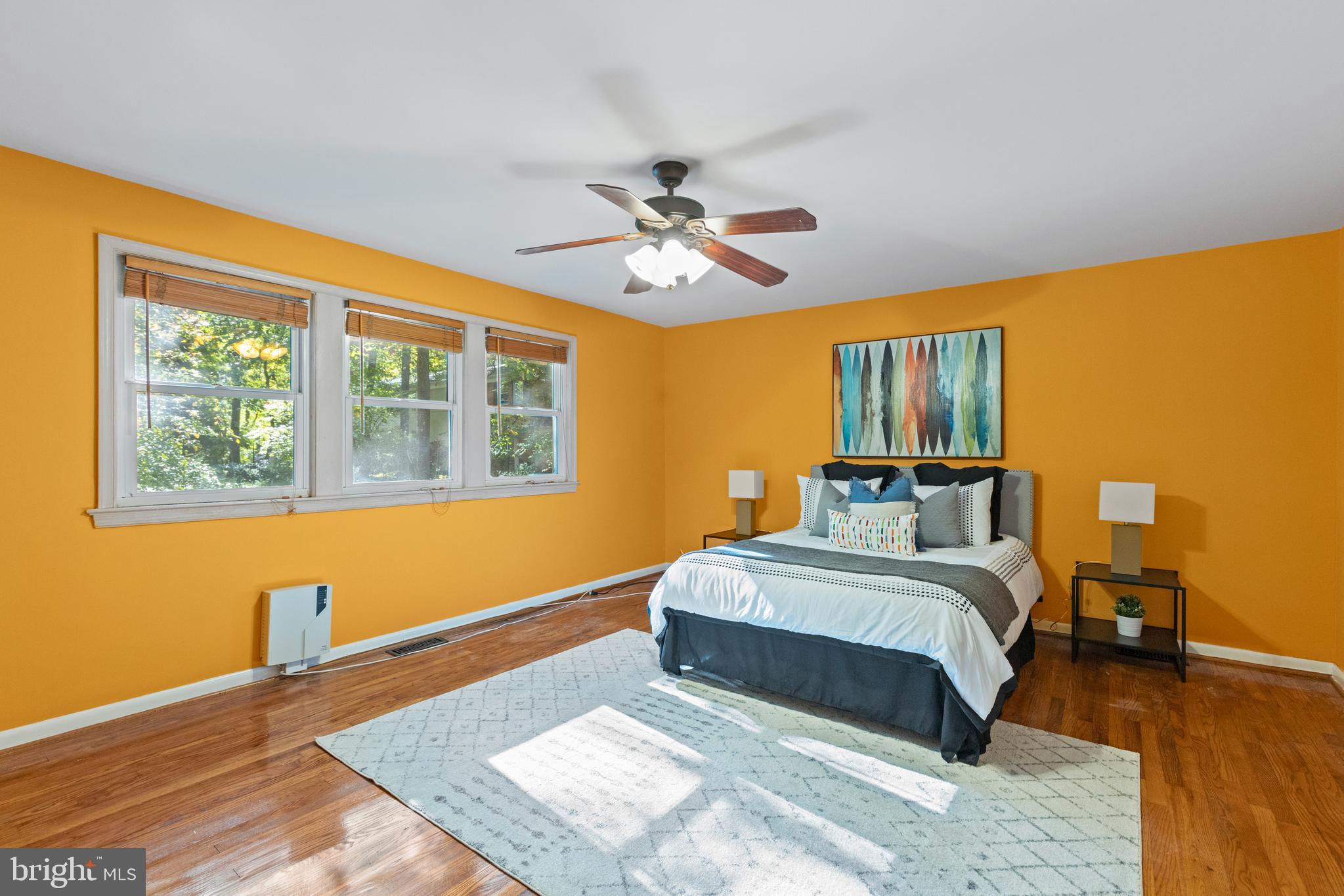 8547 Bradford Road, Unit 92 Silver Spring, MD 20901 - Photo 9 of 24 a bedroom with a bed and a window