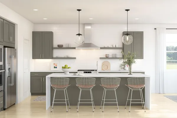 a kitchen with stainless steel appliances granite countertop a table and chairs in it
