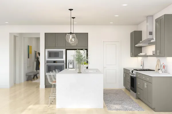 a kitchen with stainless steel appliances granite countertop a sink a stove and a refrigerator