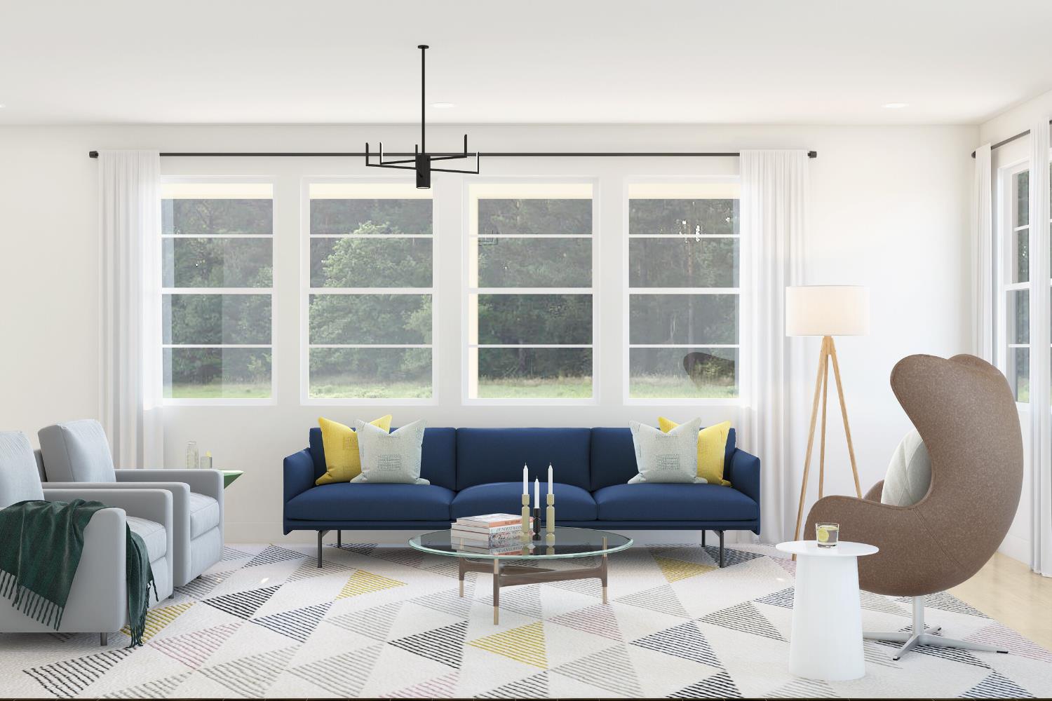 409 Glass Beach Drive Lathrop, CA 95330 - Photo 9 of 14 a living room with furniture and a large window