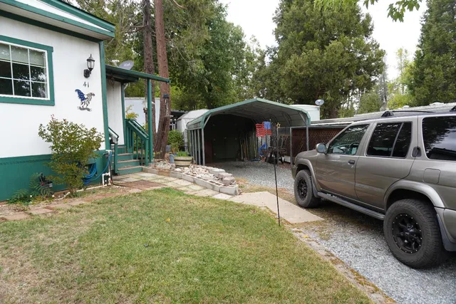 a view of a yard in front of a house