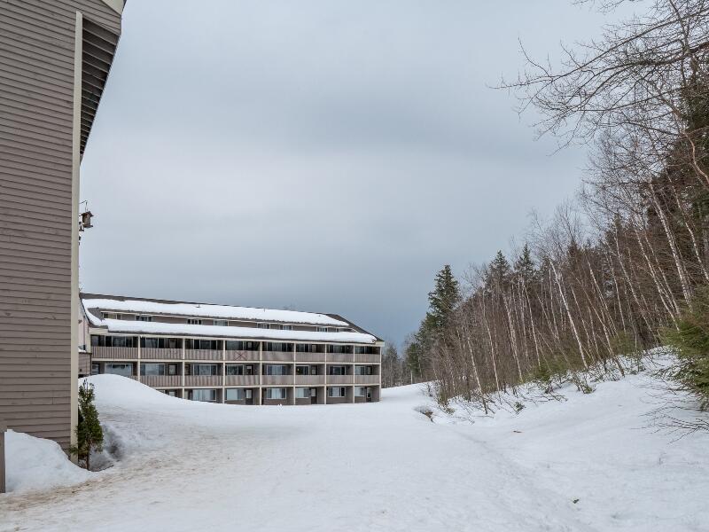 8 Fall Line Drive, Unit W103 Newry, ME 04261 - Photo 49 of 51 Fall Line West Wing Ext Winter 4