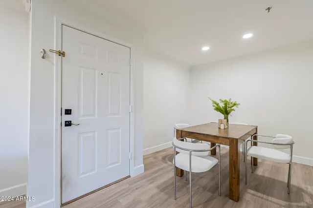 a workspace with furniture and wooden floor