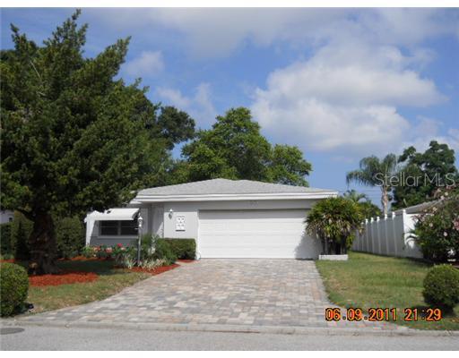 10373 Valencia Road Seminole, FL 33772 - Photo 1 of 1 a view of a house with a yard