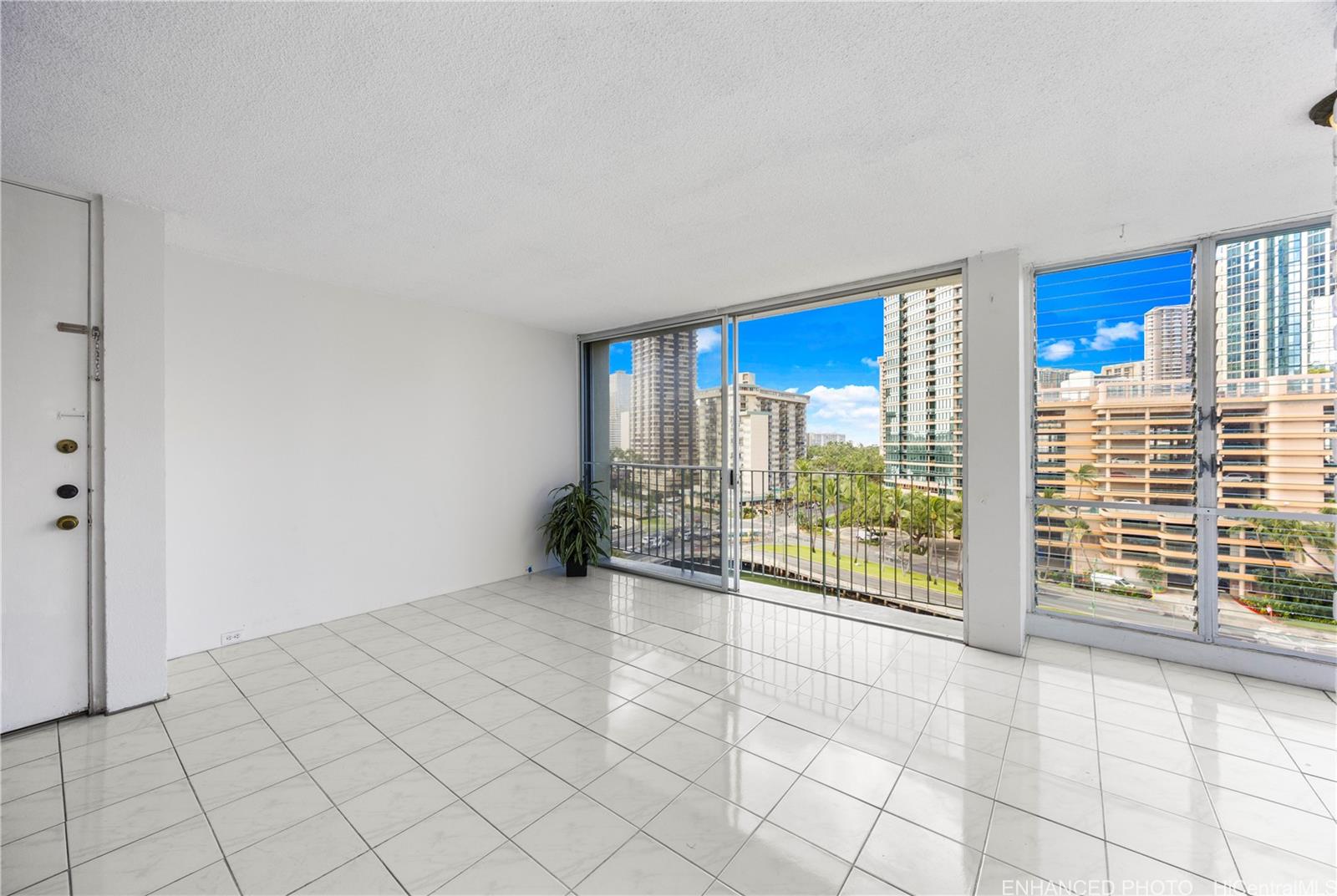 620 McCully Street, Unit 902 Honolulu, HI 96826 - Photo 3 of 23 a view of an empty room and window