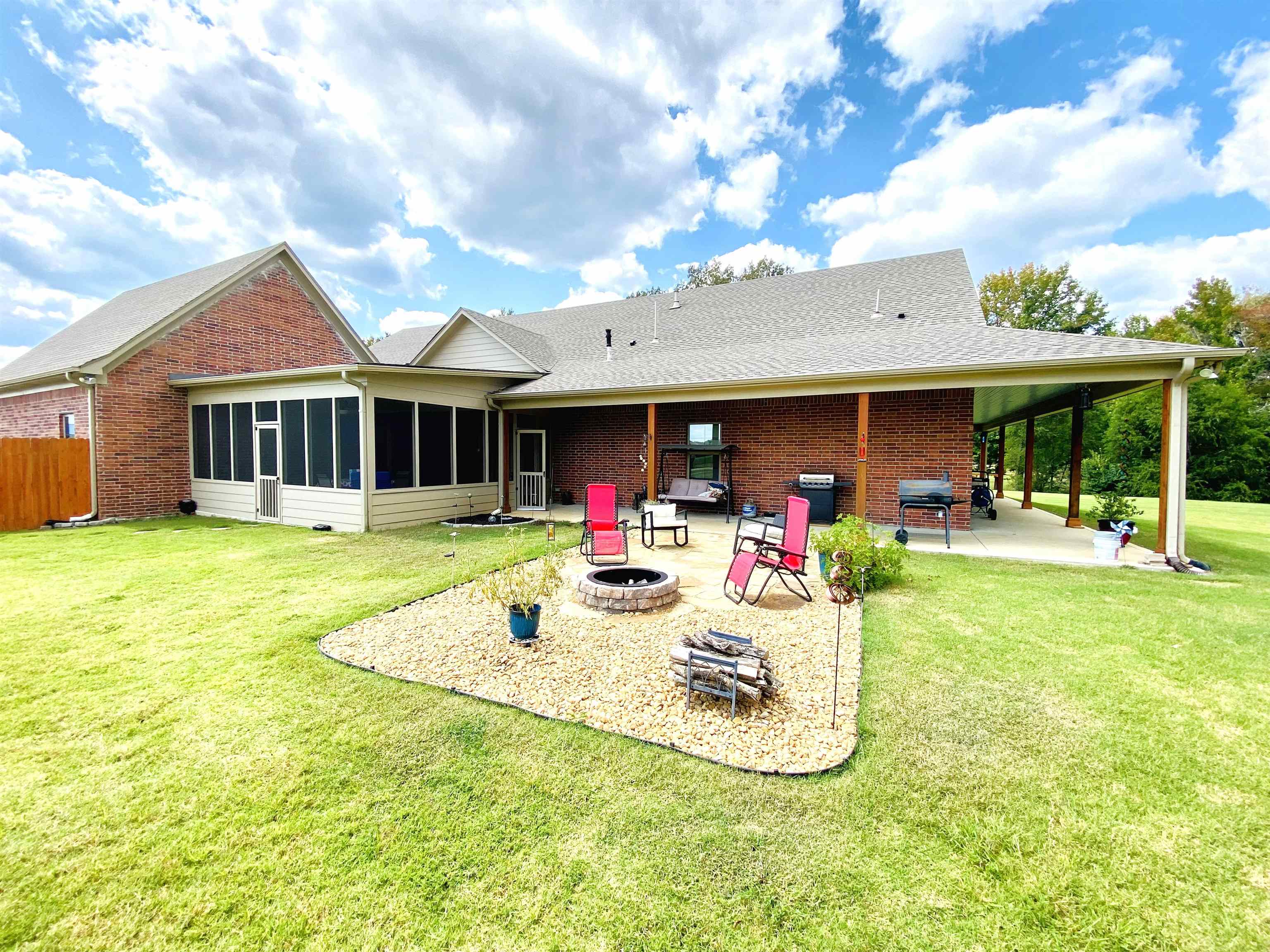 425 Honeysuckle Road Moscow, TN 38057 - Photo 19 of 25 a view of a house with a backyard patio and swimming pool