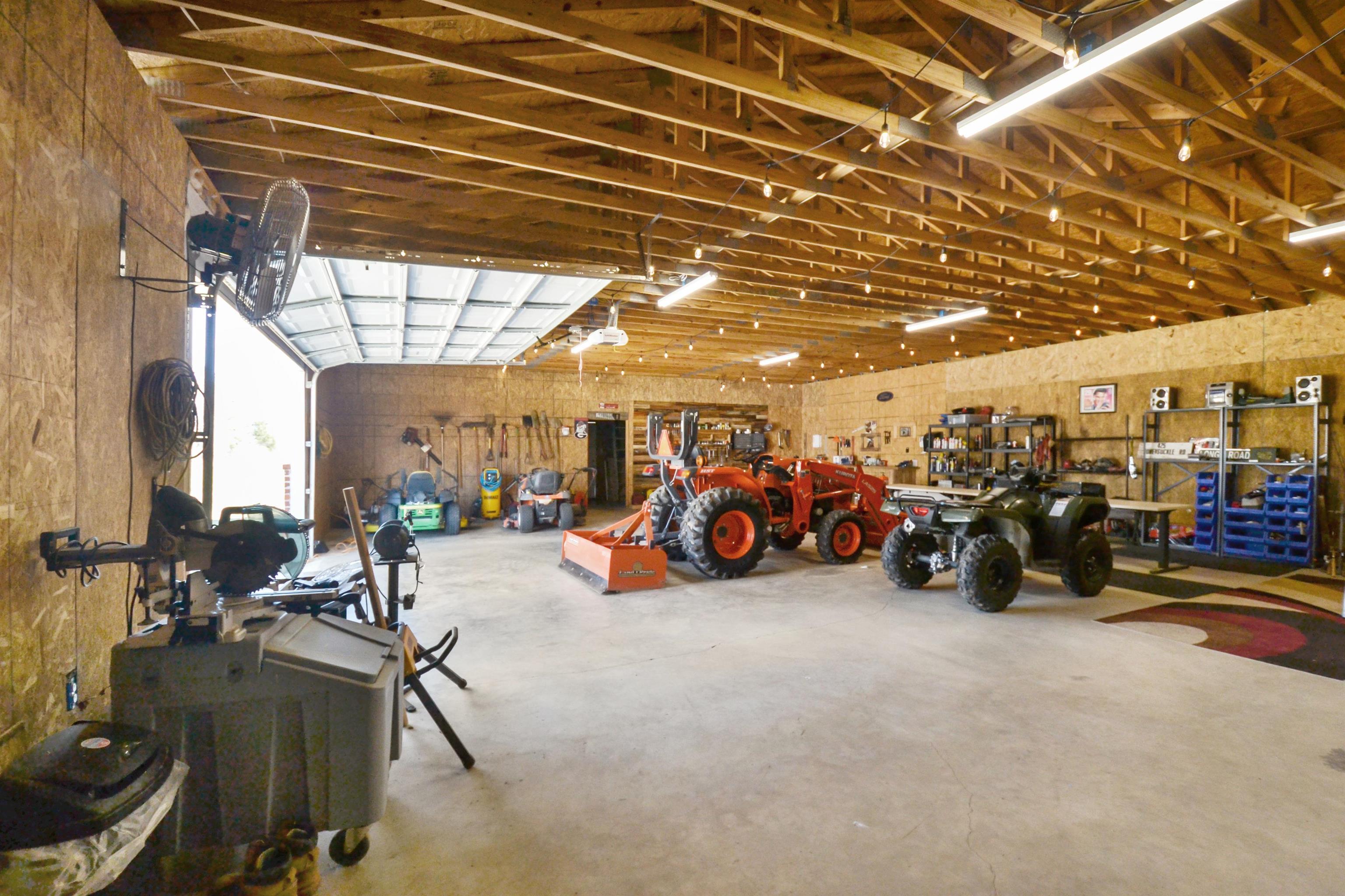 425 Honeysuckle Road Moscow, TN 38057 - Photo 21 of 25 a view of a room with gym equipment