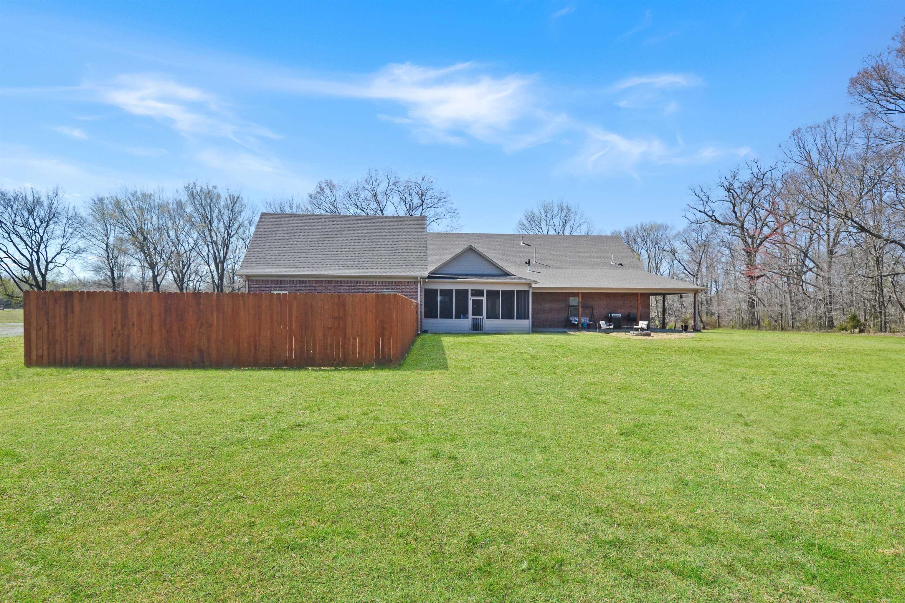 425 Honeysuckle Road Moscow, TN 38057 - Photo 23 of 25 a view of a house with a yard