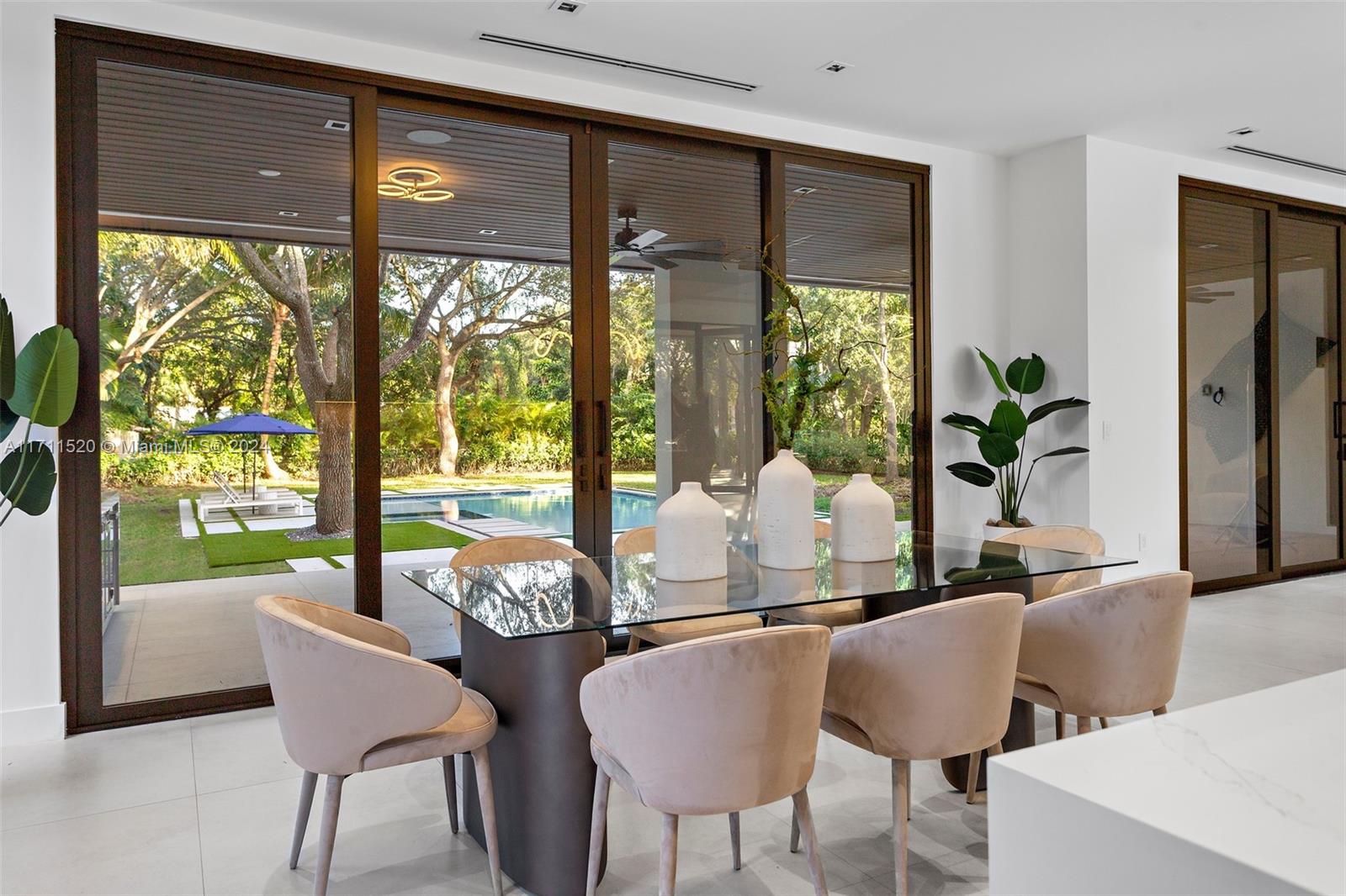 7635 Southwest 72nd Avenue Miami, FL 33143 - Photo 29 of 75 a dining room with furniture window and wooden floor