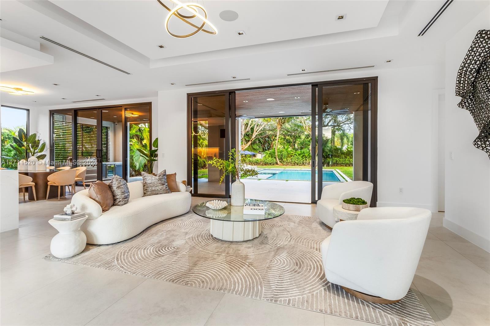 7635 Southwest 72nd Avenue Miami, FL 33143 - Photo 5 of 75 a living room with furniture and a large window