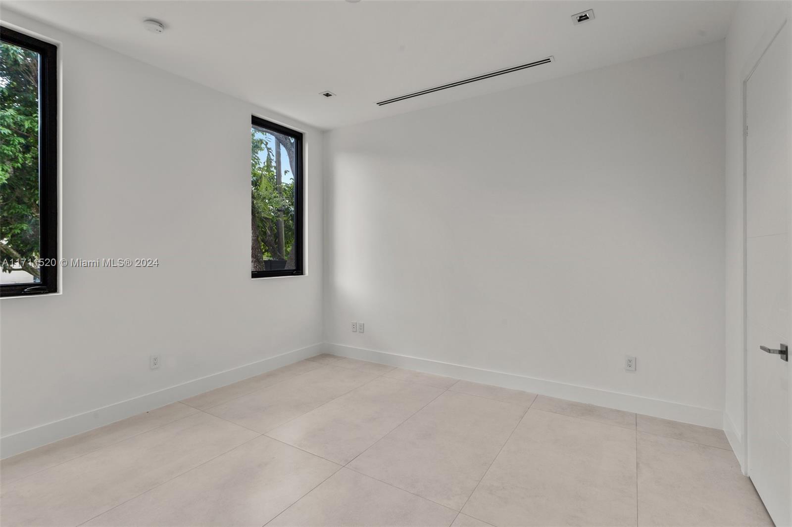 7635 Southwest 72nd Avenue Miami, FL 33143 - Photo 64 of 75 a view of an empty room with a window
