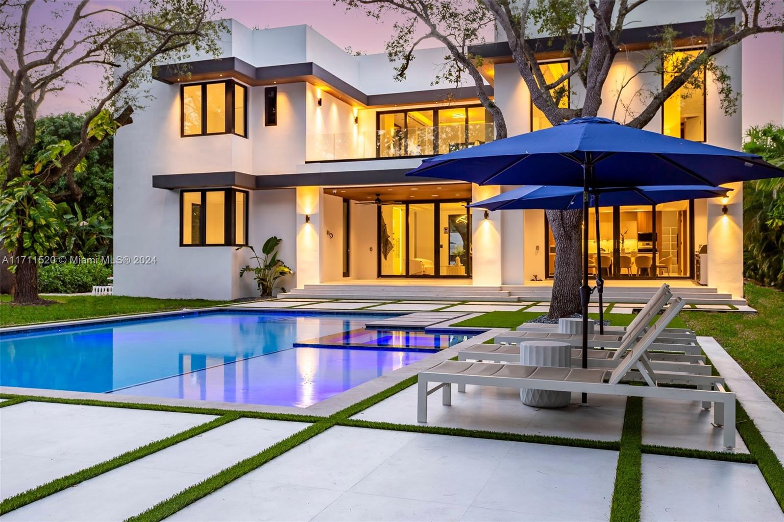 7635 Southwest 72nd Avenue Miami, FL 33143 - Photo 70 of 75 a view of swimming pool with red chairs