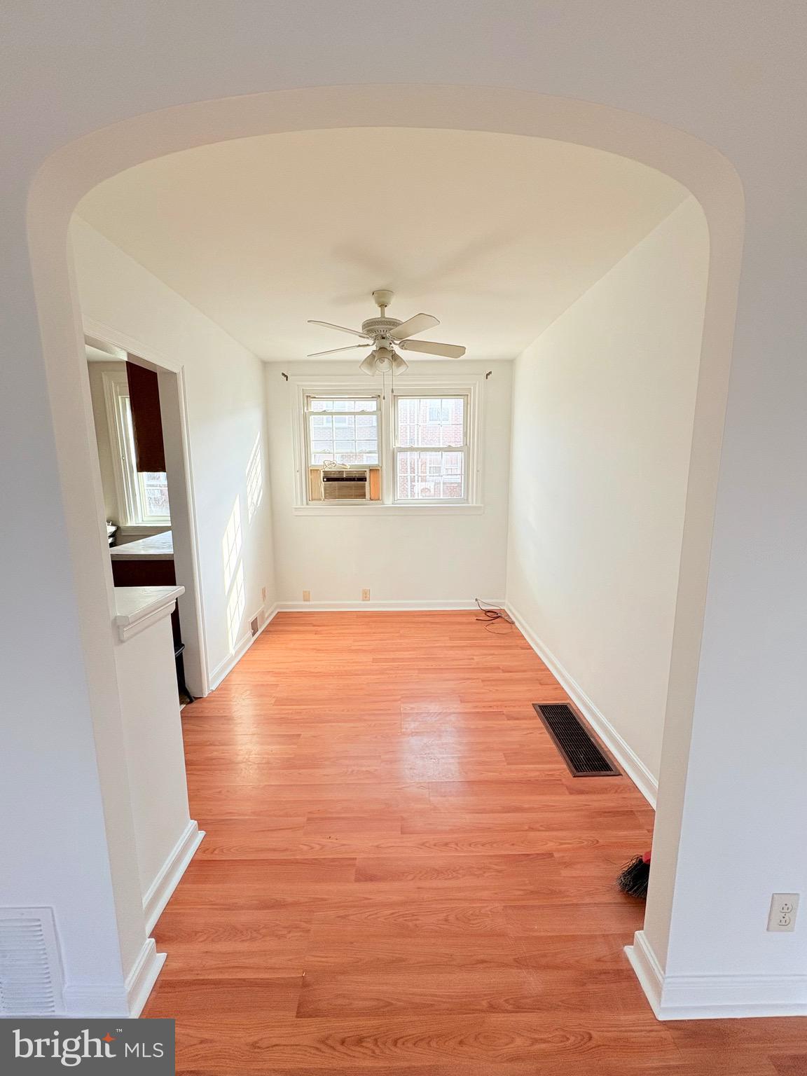 6045 Summerdale Avenue Philadelphia, PA 19149 - Photo 4 of 12 a view of empty room with wooden floor