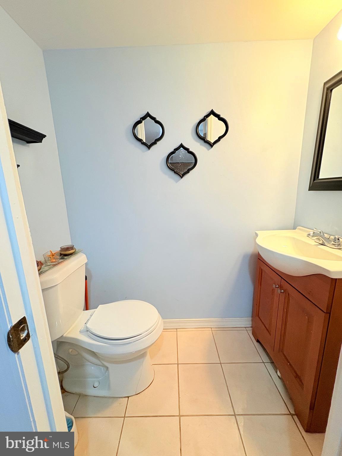 6045 Summerdale Avenue Philadelphia, PA 19149 - Photo 7 of 12 a bathroom with a toilet and a sink