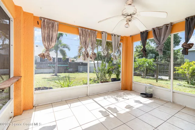 a view of a large window with an outdoor space
