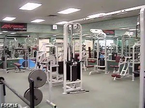 592 Fanshaw Way, Unit O Boca Raton, FL 33434 - Photo 22 of 25 a view of a room with gym equipment