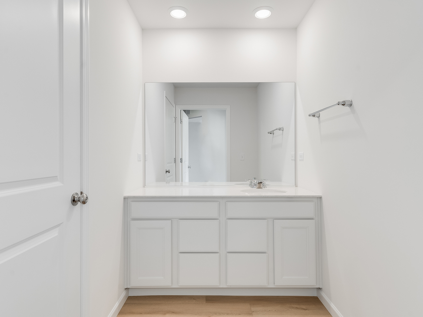 660 Switchgrass Way, Unit 58002 Bolingbrook, IL 60490 - Photo 20 of 24 a bathroom with a sink and a mirror