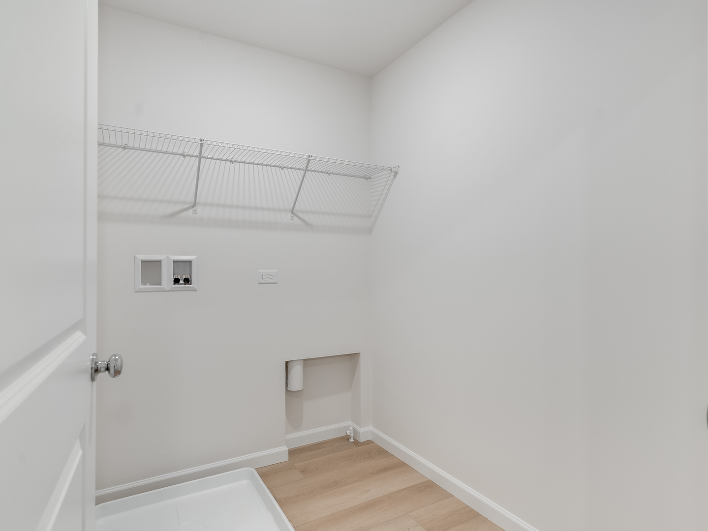 660 Switchgrass Way, Unit 58002 Bolingbrook, IL 60490 - Photo 22 of 24 a view of utility room