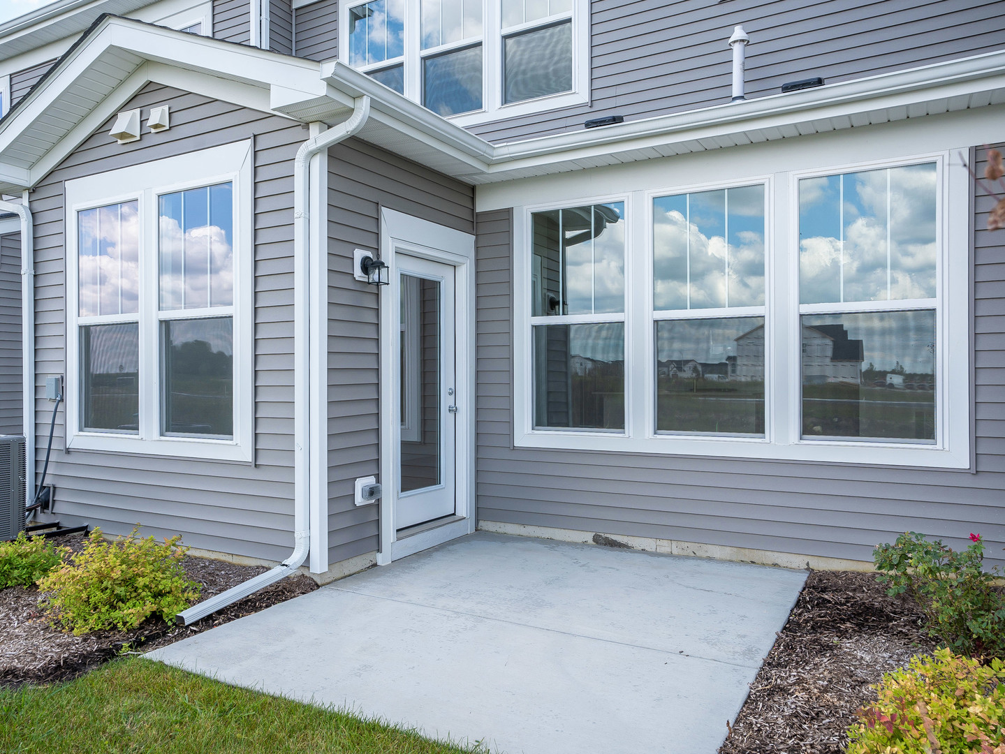 660 Switchgrass Way, Unit 58002 Bolingbrook, IL 60490 - Photo 23 of 24 a view of entrance of the house