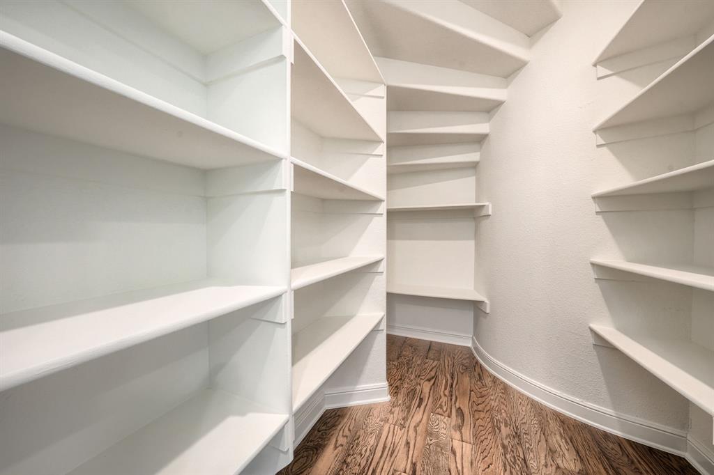 3101 Raphael Court McKinney, TX 75070 - Photo 14 of 40 a view of walk in closet with empty racks