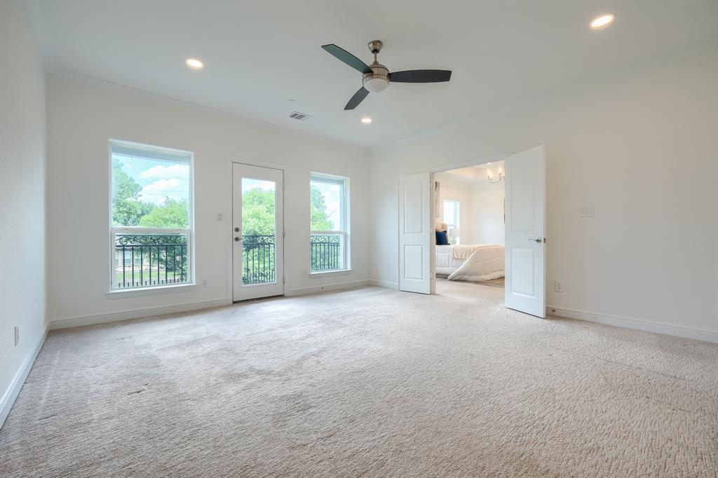 3101 Raphael Court McKinney, TX 75070 - Photo 18 of 40 a view of a livingroom with a ceiling fan and window