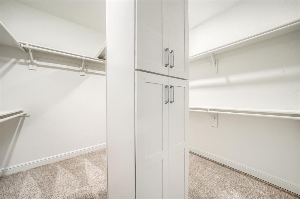 3101 Raphael Court McKinney, TX 75070 - Photo 33 of 40 a view of walk in closet with empty racks