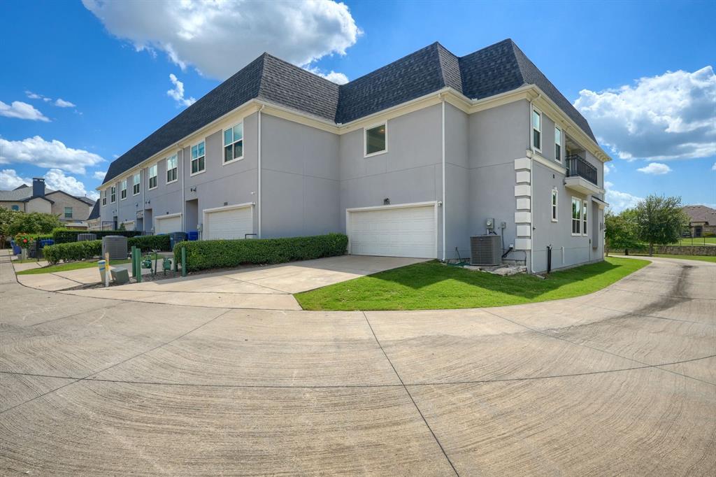 3101 Raphael Court McKinney, TX 75070 - Photo 36 of 40 a front view of a house with a yard and garage