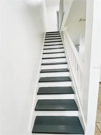 a bathroom with a sink toilet tub and shower