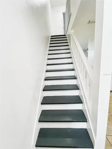 a bathroom with a sink toilet tub and shower