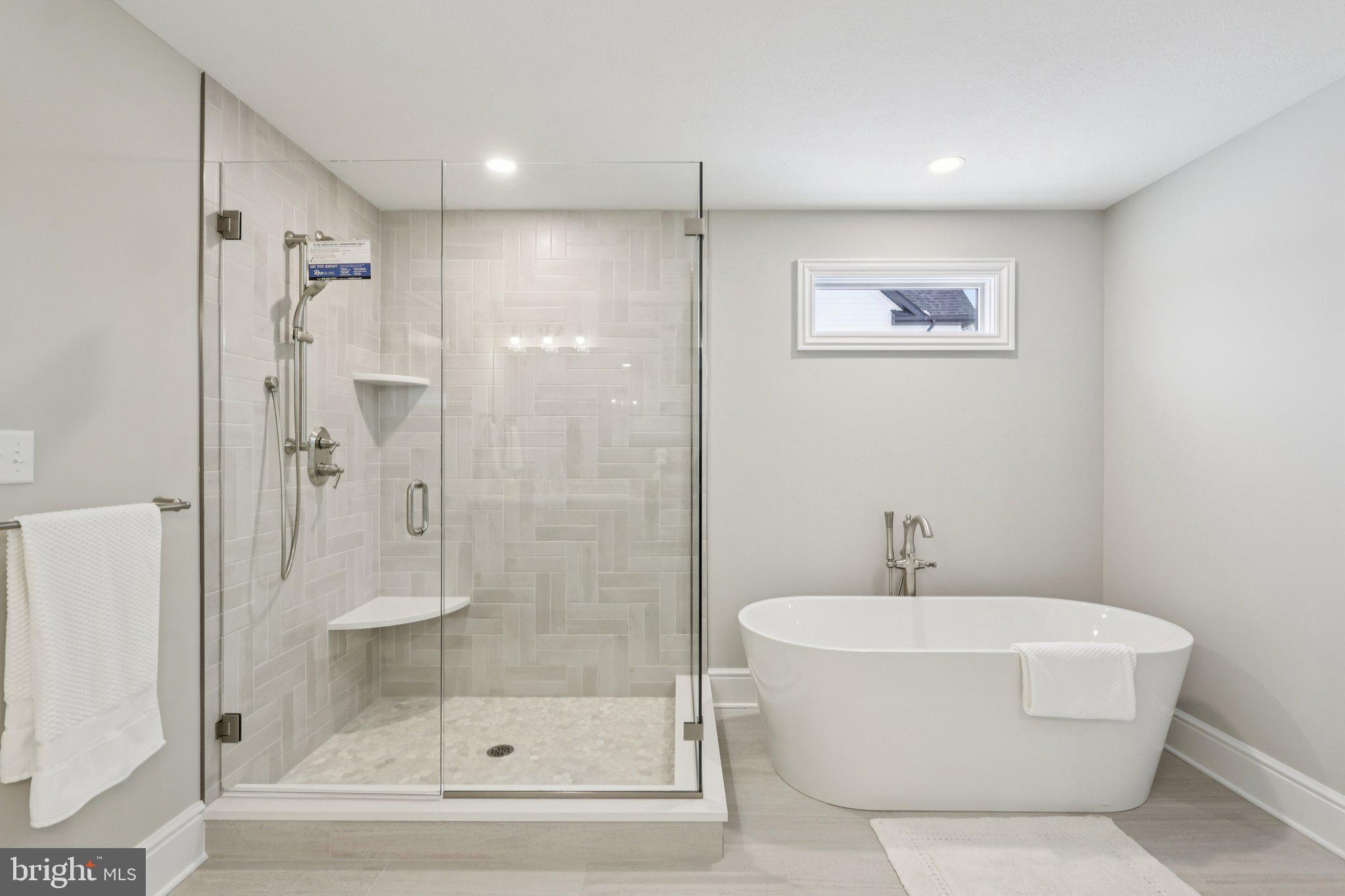 510 Newcomen Road, Unit F1P Exton, PA 19341 - Photo 28 of 56 a bathroom with a bathtub and shower