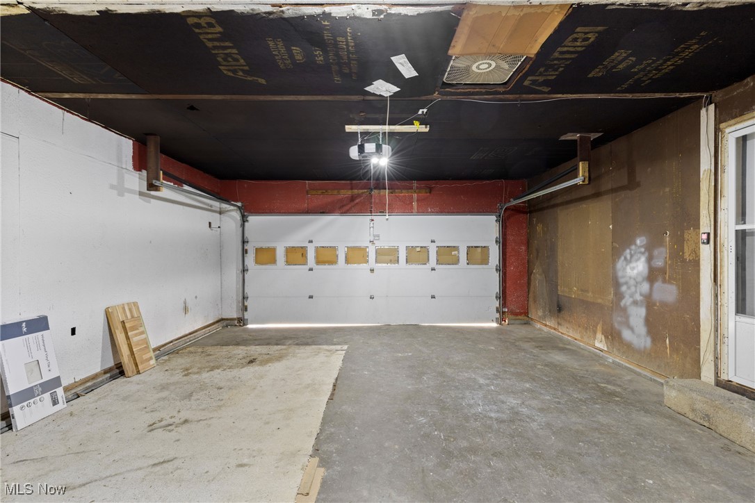 61899 Webb Heights Road Shadyside, OH 43947 - Photo 22 of 39 Garage featuring a garage door opener