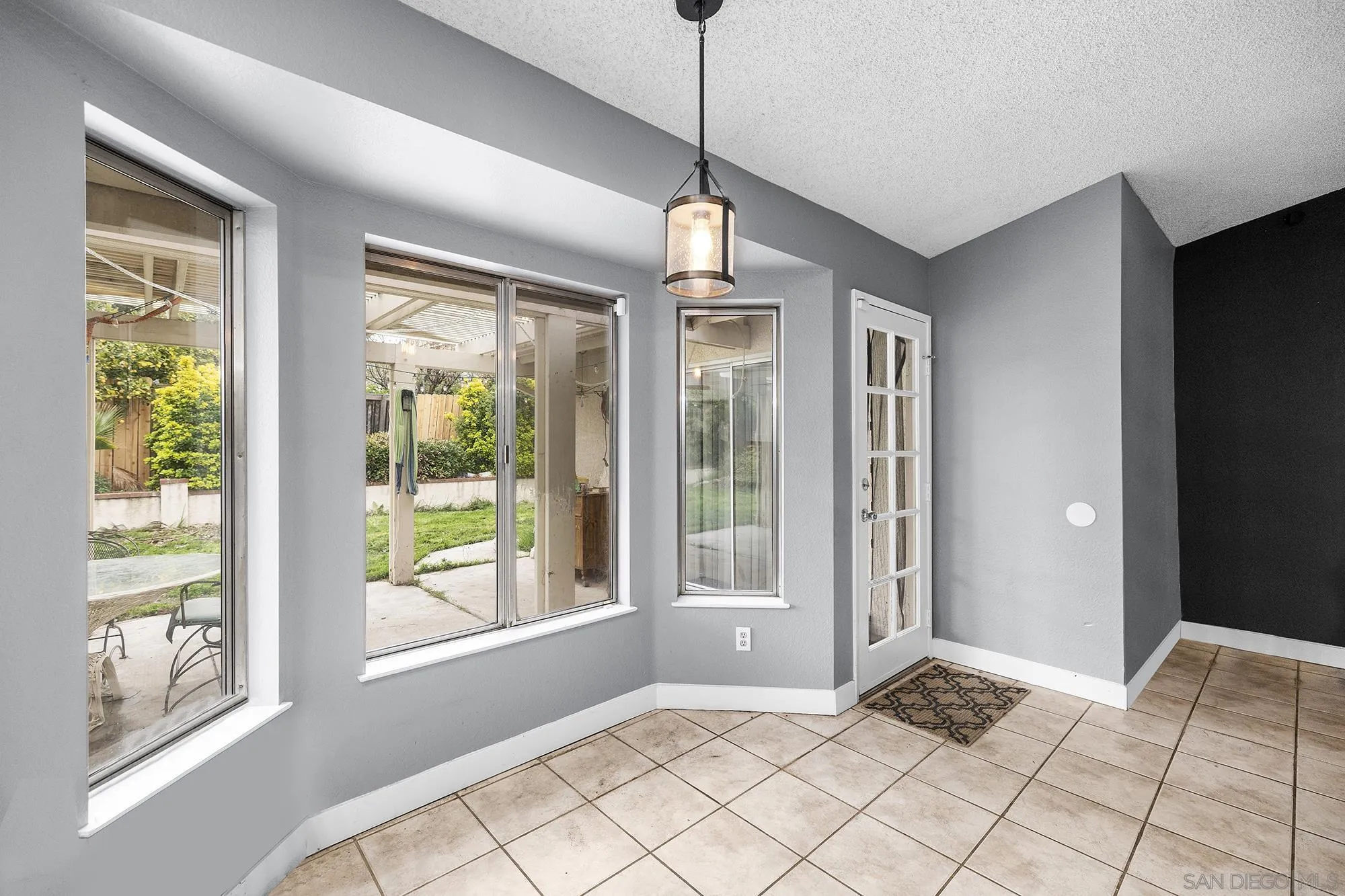 31297 Huron Street Temecula, CA 92592 - Photo 13 of 42 a view of an entryway with wooden floor and windows