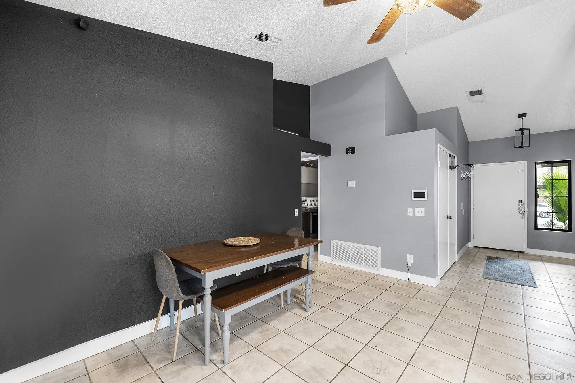 31297 Huron Street Temecula, CA 92592 - Photo 16 of 42 a view of a hallway with seating area
