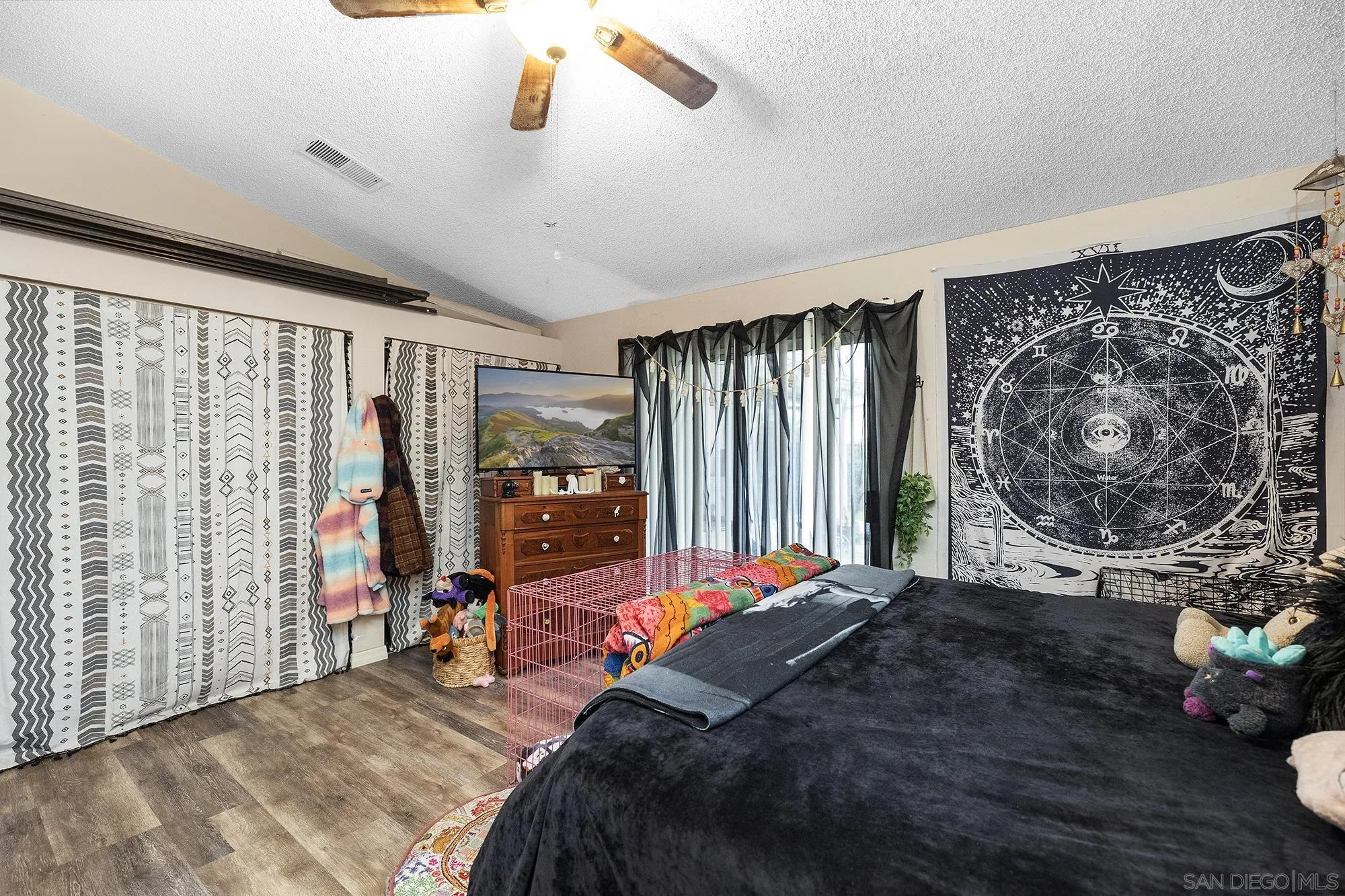 31297 Huron Street Temecula, CA 92592 - Photo 18 of 42 a bed sitting in a bedroom next to a window