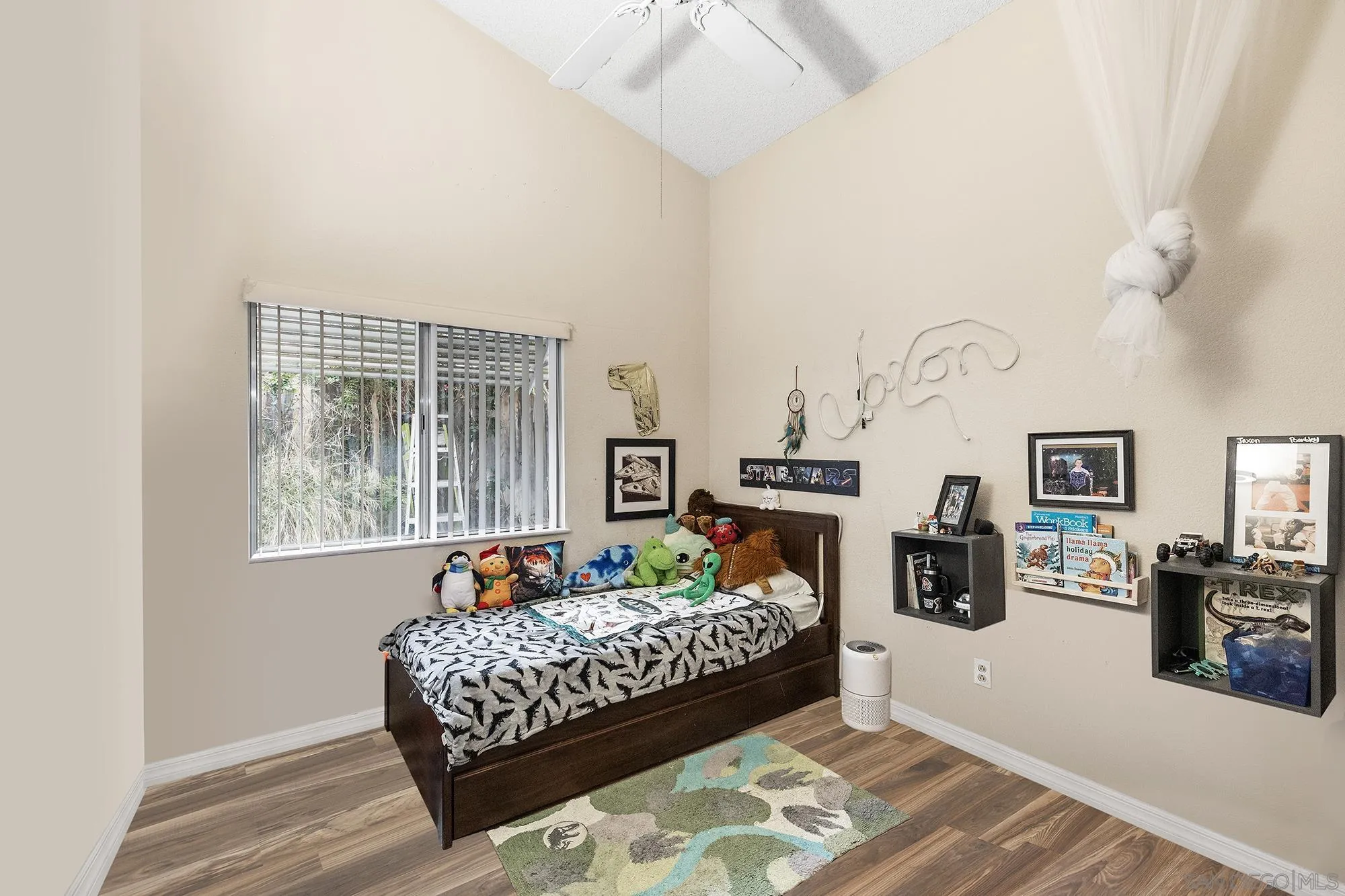 31297 Huron Street Temecula, CA 92592 - Photo 21 of 42 a bedroom with bed and a window