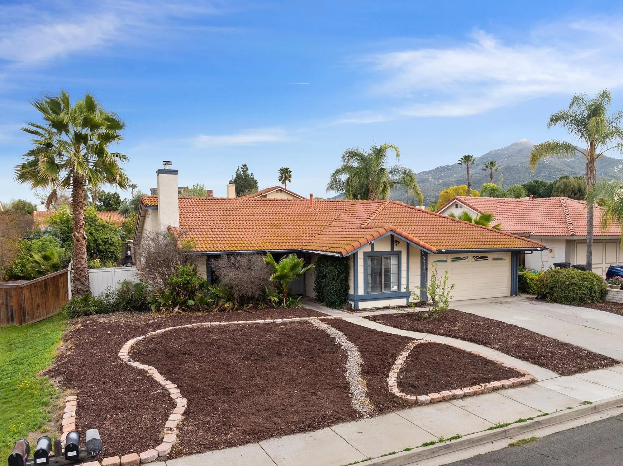 31297 Huron Street Temecula, CA 92592 - Photo 41 of 42 a front view of a house with garden
