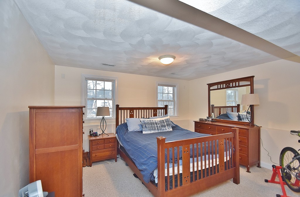 48 Partridge Road Billerica, MA 01821 - Photo 15 of 19 a bedroom with furniture and a window