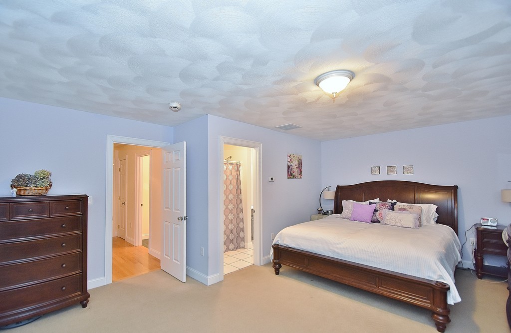 48 Partridge Road Billerica, MA 01821 - Photo 10 of 19 a bedroom with a bed and a closet