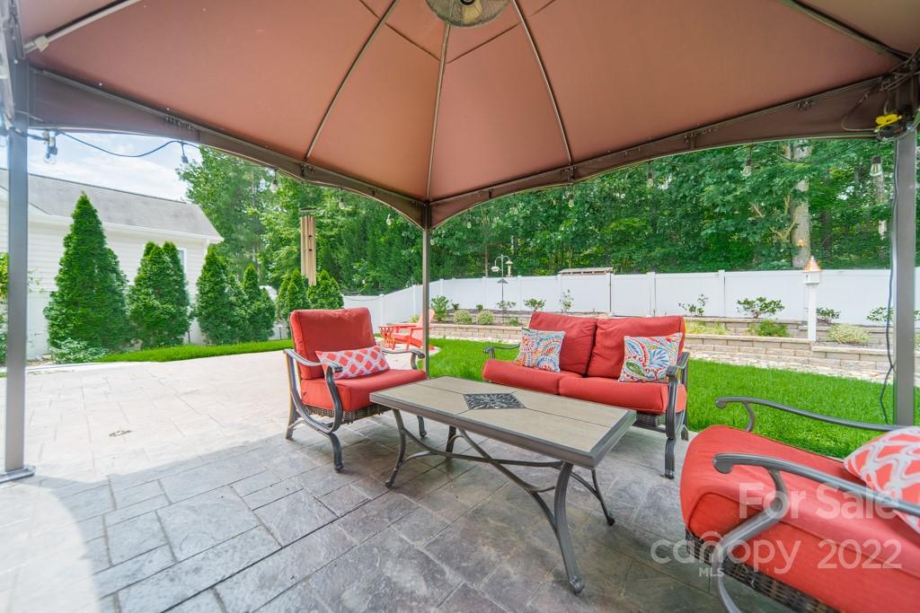 79109 Ridgehaven Road Lancaster, SC 29720 - Photo 18 of 48 a backyard of a house with outdoor seating
