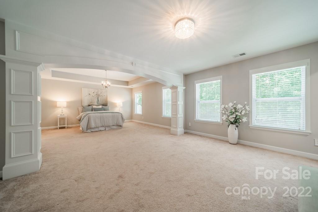 79109 Ridgehaven Road Lancaster, SC 29720 - Photo 27 of 48 a view of a livingroom with a staircase and a fireplace