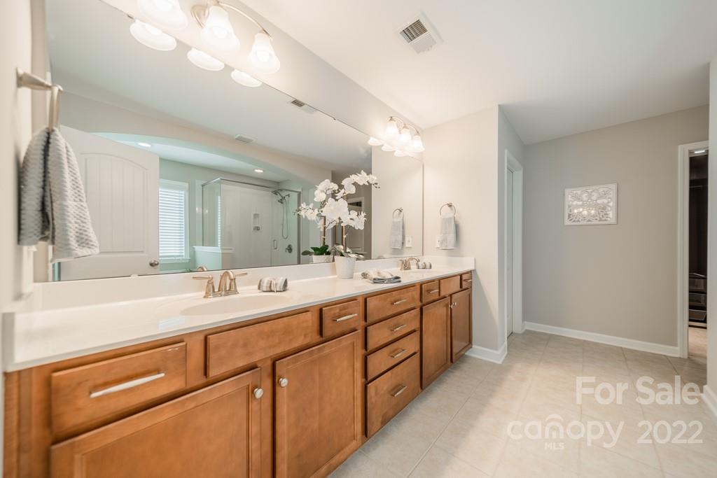79109 Ridgehaven Road Lancaster, SC 29720 - Photo 29 of 48 a bathroom with a sink and a mirror