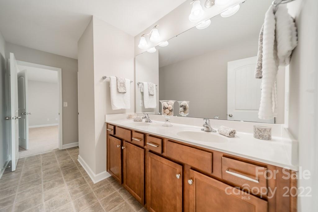 79109 Ridgehaven Road Lancaster, SC 29720 - Photo 32 of 48 a bathroom with a double vanity sink mirror and double