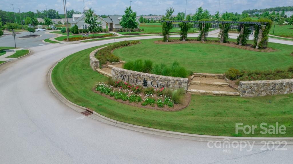 79109 Ridgehaven Road Lancaster, SC 29720 - Photo 42 of 48 a view of a garden with a fountain